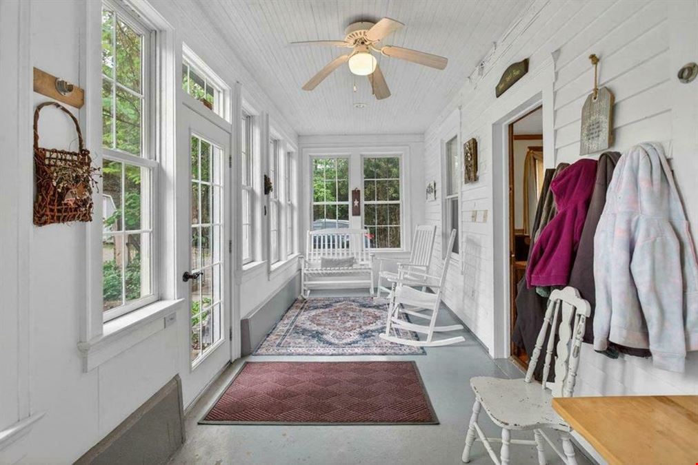 UPDATED RESIDENCE & 30X40 SHOP | ZONED BUSINESS ON 1.3 ACRES