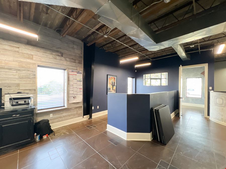 Office Warehouse w/ Rental Income Bordering Airport