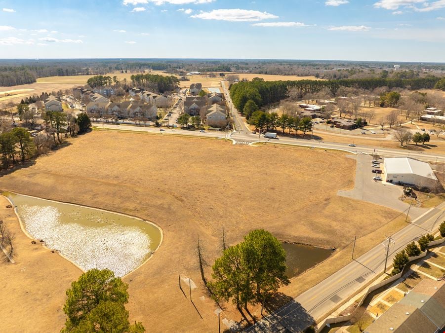 7.99 Acres C-1 Development Land at Lighted Intersection