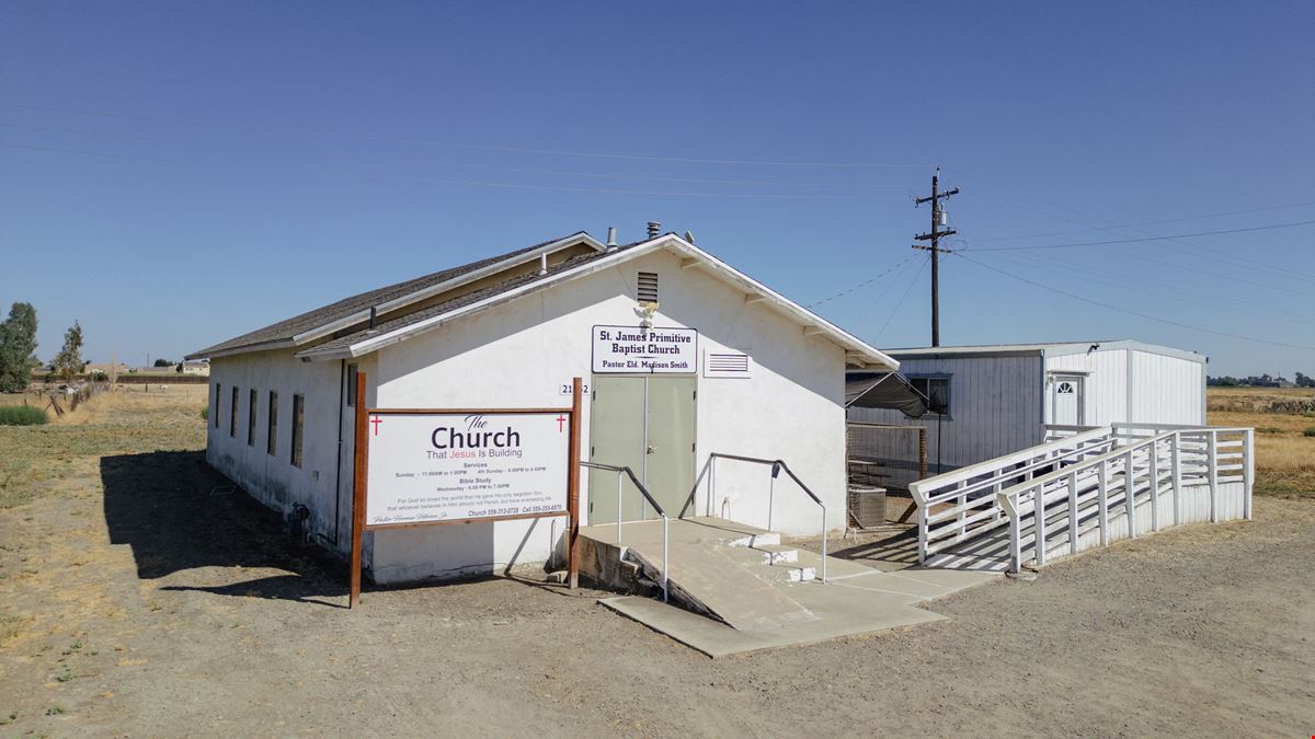 Church building with Modular home and 2 Sheds perfect for storage!