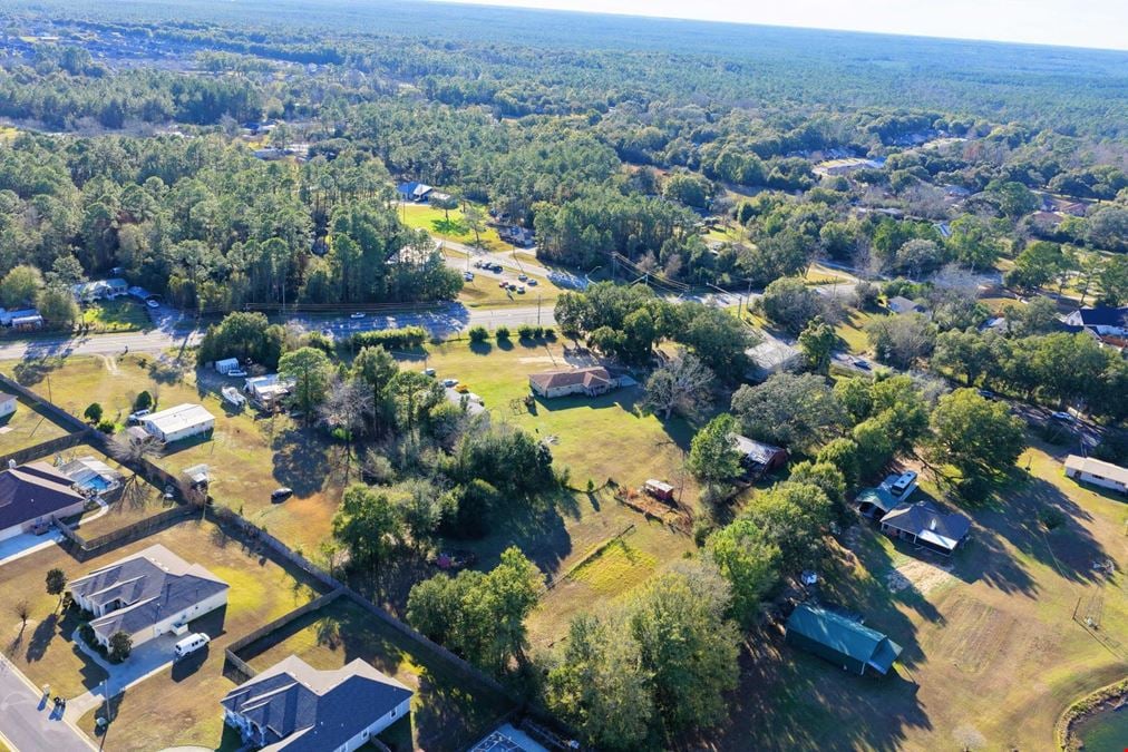7998 Mobile Hwy | Signalized Hard Corner For Sale
