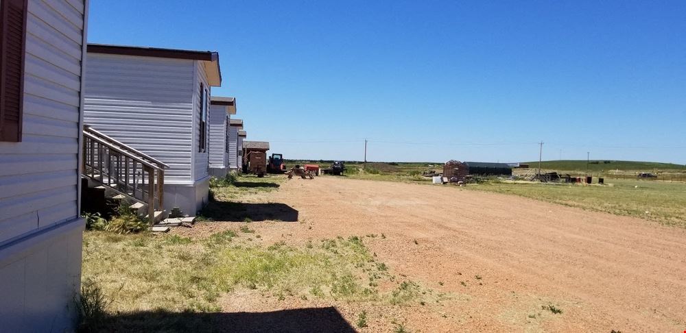 5 ACRES WITH 5 APPROVED MANUFACTURED HOMES