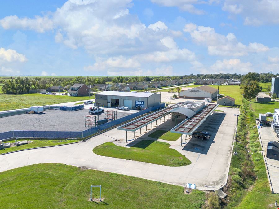 Former Sonic Drive-In with 1 Acre of Concrete Near Major Plants