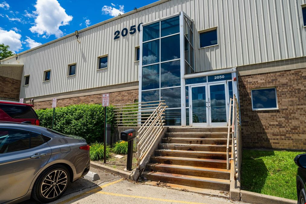 Industrial Facility with Office Space & Fleet Storage & 11.8± AC Dev. Site