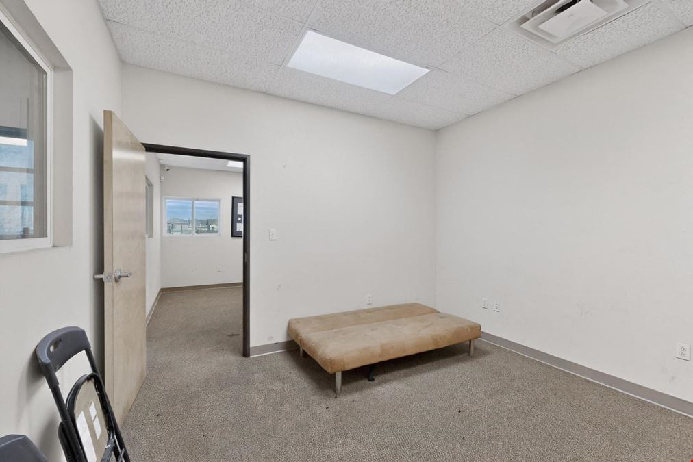 RARE WAREHOUSE WITH GATED & PAVED YARD