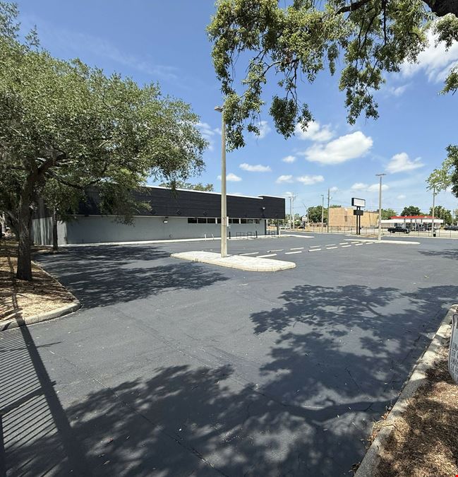 PREMIER TAMPA SHOWROOM- 13,296 SF Freestanding Building 1.42 ACRES  Signalized corner  LED Billboard Signage