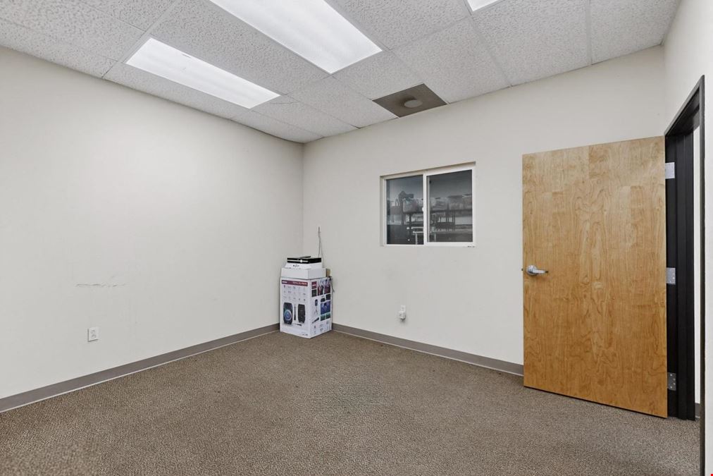 RARE WAREHOUSE WITH GATED & PAVED YARD