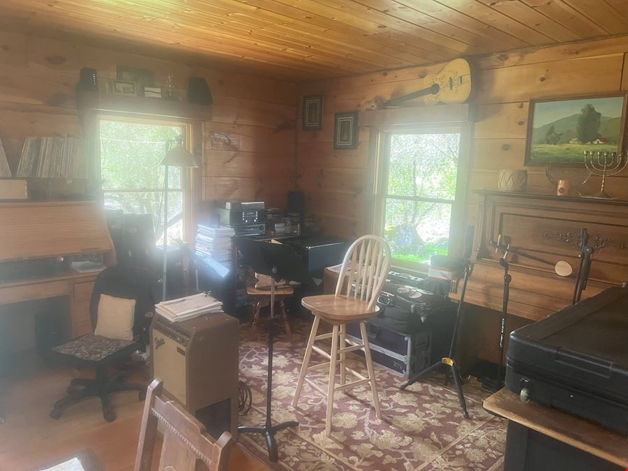 Logs, Cabins & Land