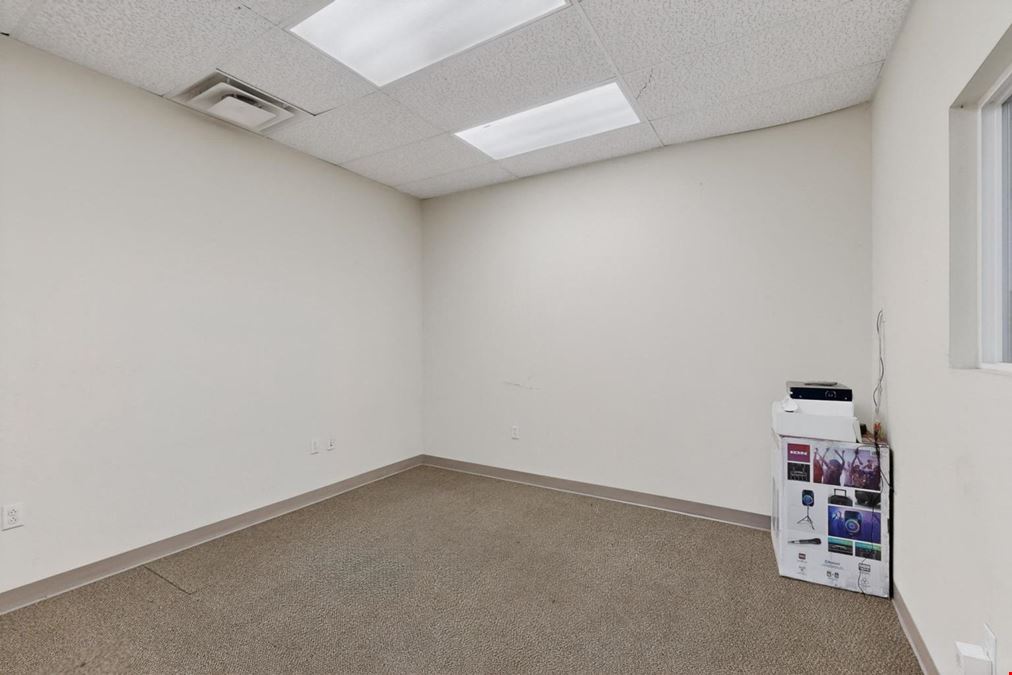 RARE WAREHOUSE WITH GATED & PAVED YARD