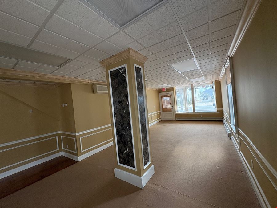 For Sale: Mixed-Use Retail/Office + 4 Apartments