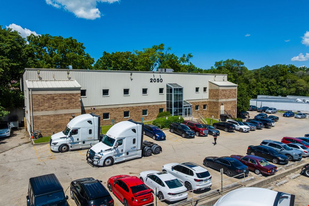 Industrial Facility with Office Space & Fleet Storage & 11.8± AC Dev. Site