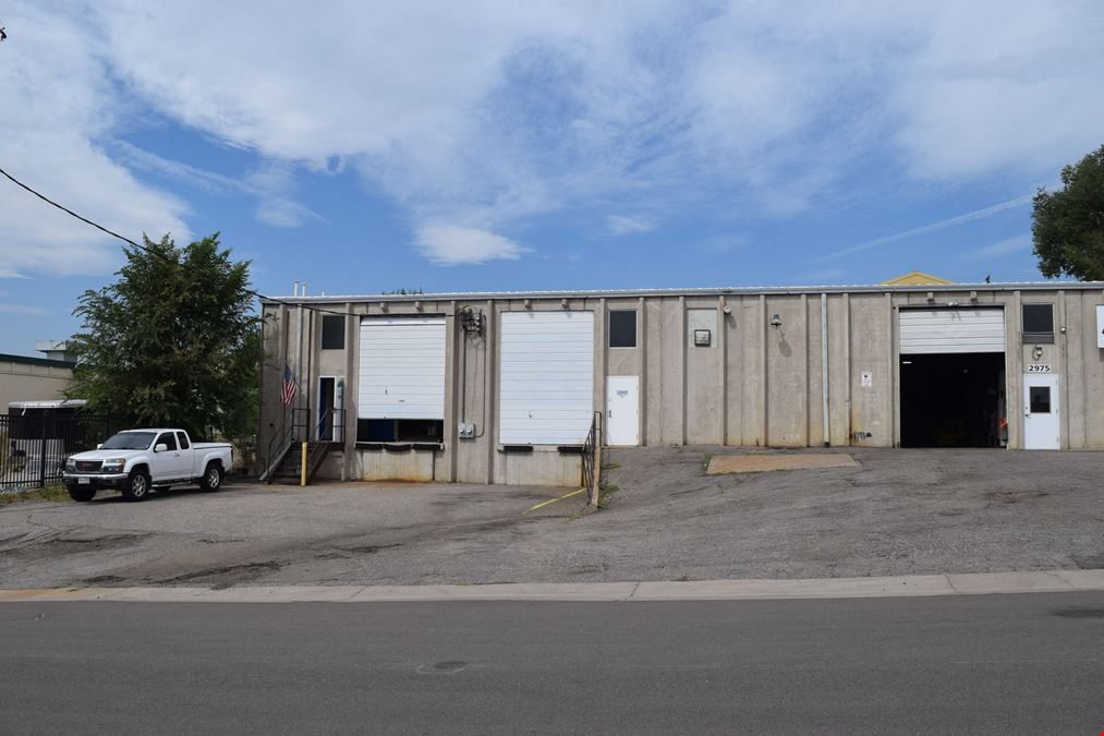 2,000 SF warehouse with dock high loading (drive in access potential)
