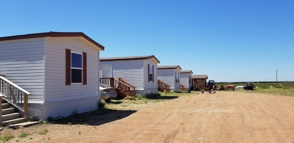 5 ACRES WITH 5 APPROVED MANUFACTURED HOMES