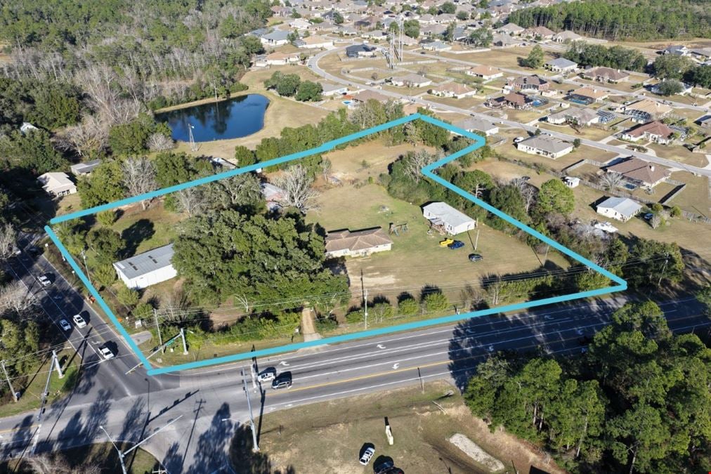 7998 Mobile Hwy | Signalized Hard Corner For Sale