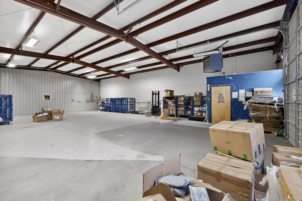 RARE WAREHOUSE WITH GATED & PAVED YARD