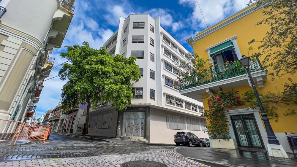 Redevelopment Opportunity: 15 Apartments and 4 Retail Locales in 8-Story Building in Old San Juan with Panoramic Views - For Sale