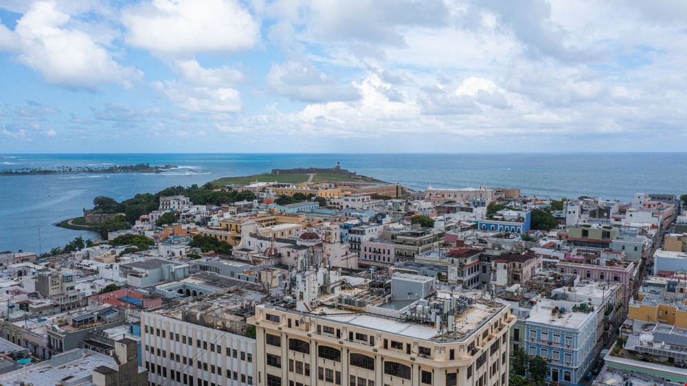Redevelopment Opportunity: 15 Apartments and 4 Retail Locales in 8-Story Building in Old San Juan with Panoramic Views - For Sale