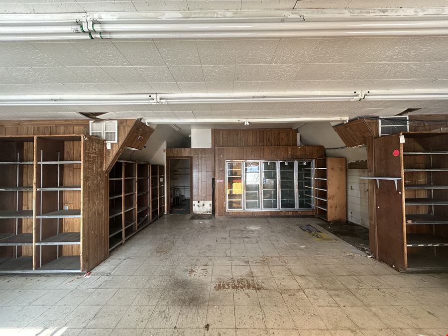 RETAIL LOT WITH BUILDING  NEXT TO WALMART
