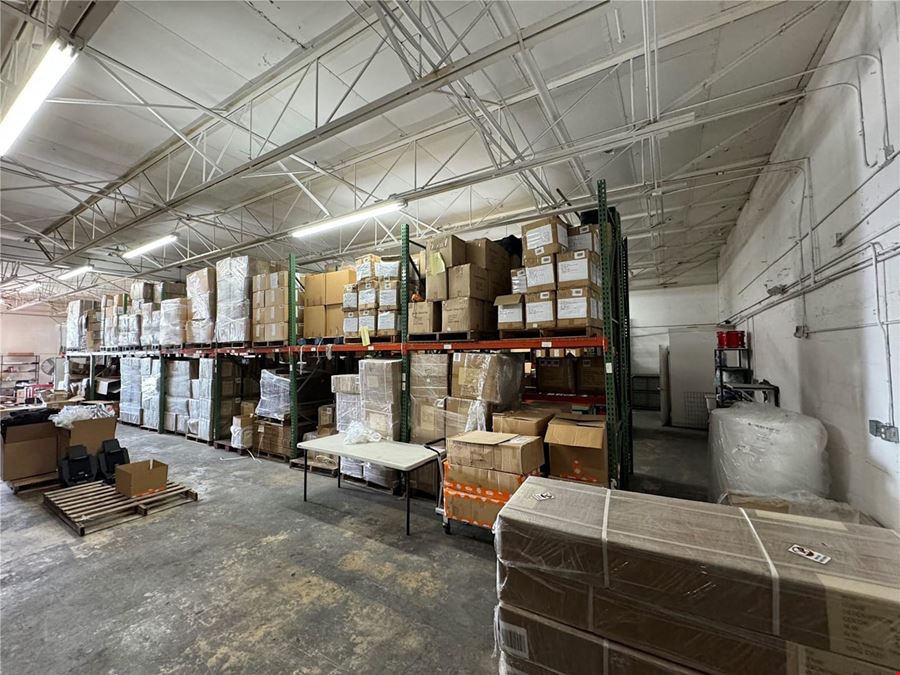 1.72 Acre Total Lot with Existing +/- 26,304 SF Multi-Tenant Warehouse