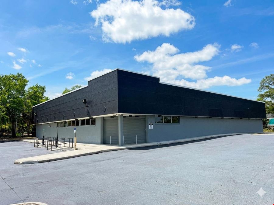 PREMIER TAMPA SHOWROOM- 13,296 SF Freestanding Building 1.42 ACRES  Signalized corner  LED Billboard Signage