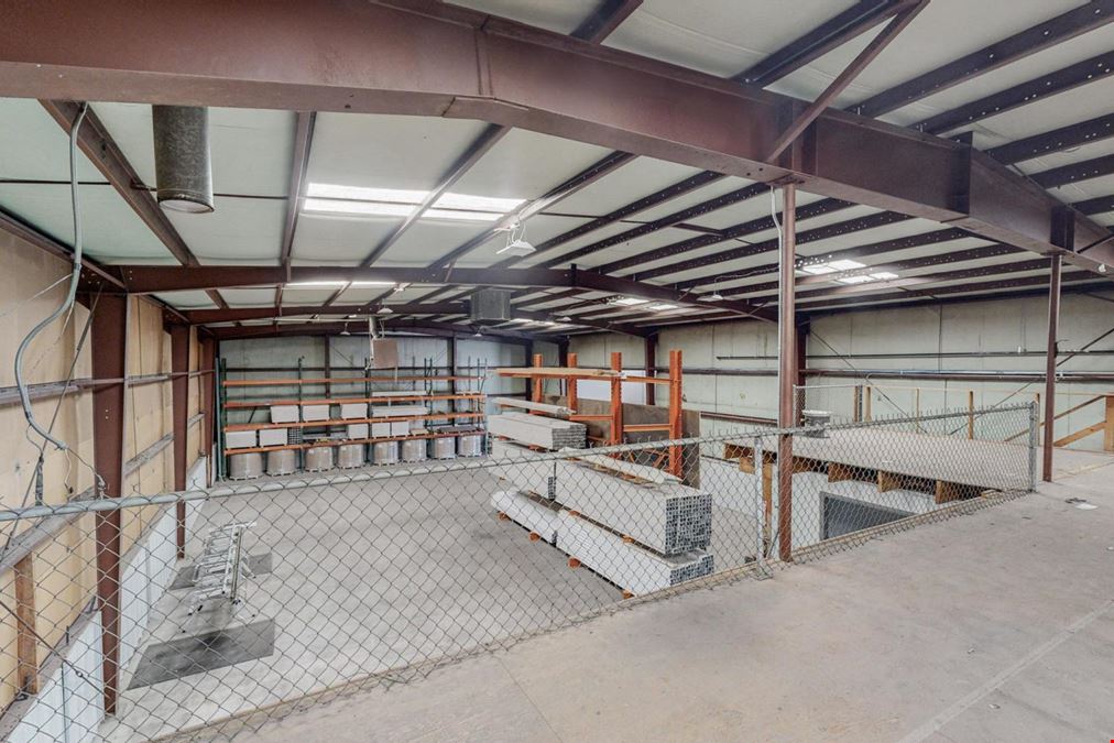 Newly Updated Clearspan Warehouse with Gated & Paved Yard near Big I