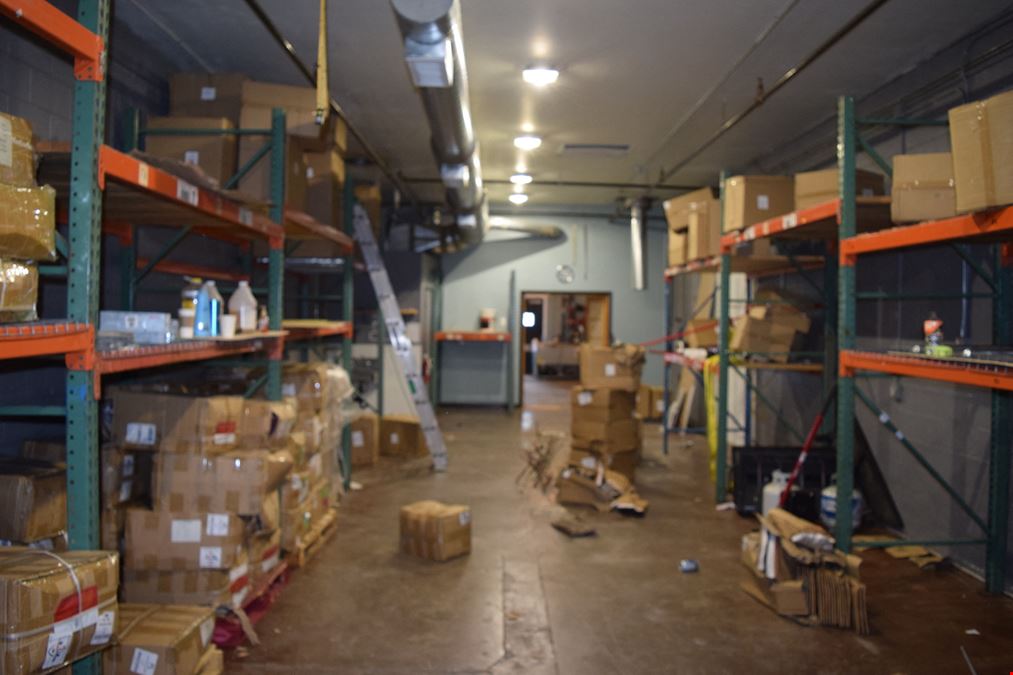 1,500 SF free-standing office/warehouse with small yard.