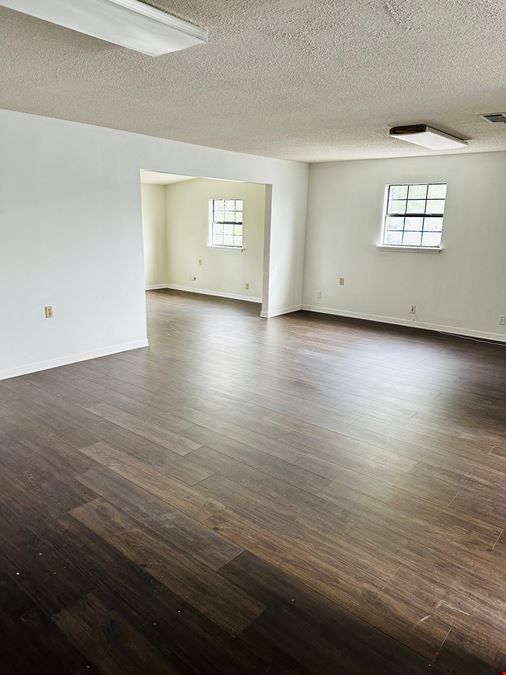 Income Producing Property w/Upside