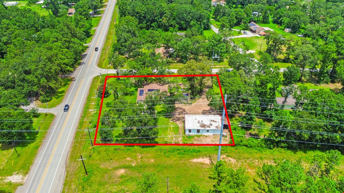 Unrestricted Versatile 1-Acre Commercial Property in Conroe –  Industrial Storage Shed & Carport & home