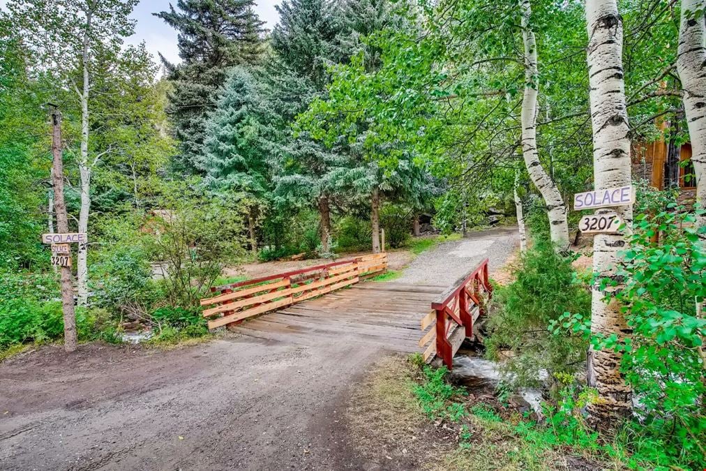 Water & Stone Cabins | 14-Keys | C-3 Zoning | Live Creek Frontage | 6.7 CAP