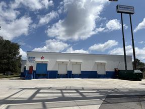 BrandsMart Warehouse (Vacant) & Billboard