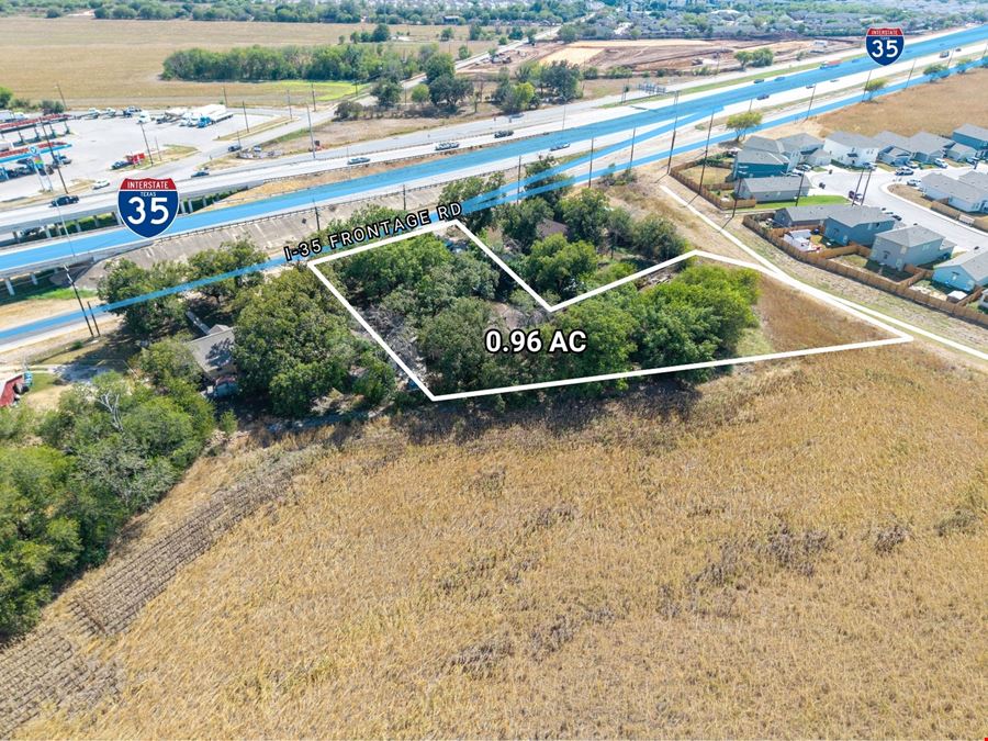 0.96 AC on I-35 South Frontage, Zoned C-3R / I-1, 1,960 SF Building