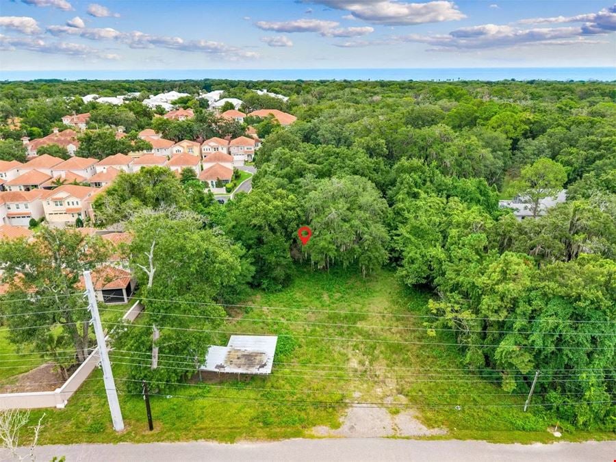 Prime 5.07-Acre Coastal Flexible Investment: Dual-Zoned Commercial & Residential Land Near Amelia Island