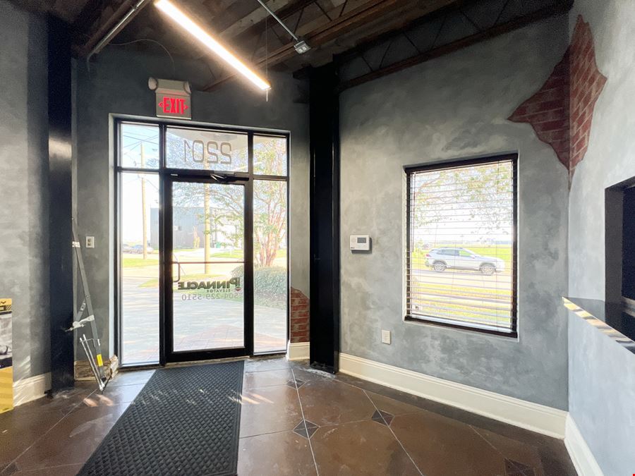 Office Warehouse w/ Rental Income Bordering Airport