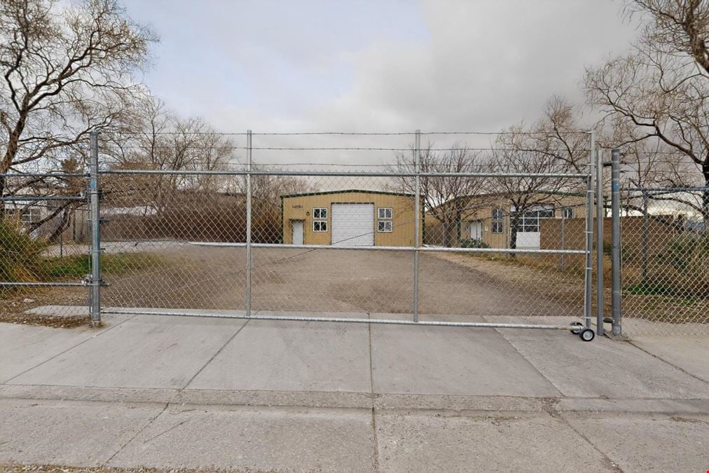 RARE WAREHOUSE WITH GATED & PAVED YARD