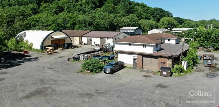 5,460 SF Building, 10,000 SF Insulated Structure, and 7,000 SF Quonset Hut for Sale or Lease in New Kensington, PA