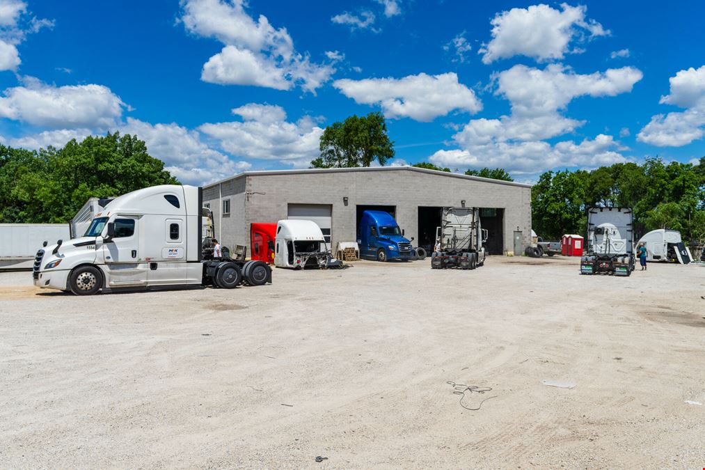 Industrial Facility with Office Space & Fleet Storage & 11.8± AC Dev. Site
