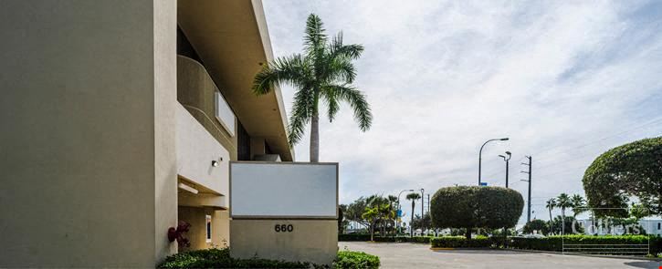 Boutique owner-user office building with oversized balconies and garage parking in North Palm Beach, FL