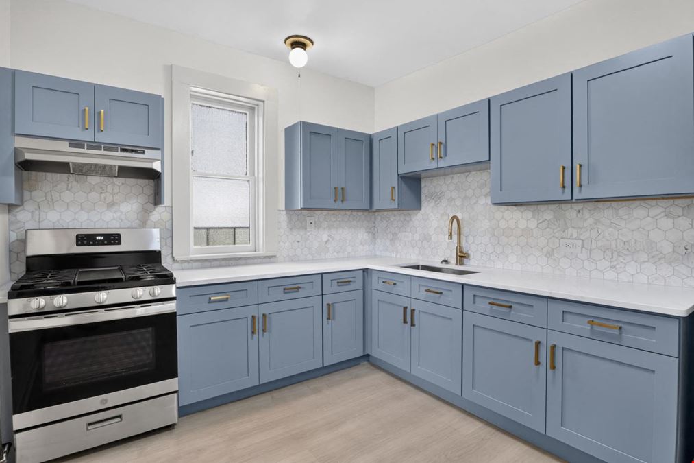 1528 E 74TH PL | 6 Unit Multifamily