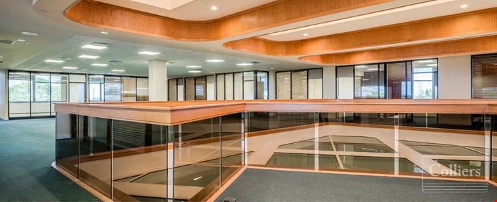 Boutique owner-user office building with oversized balconies and garage parking in North Palm Beach, FL