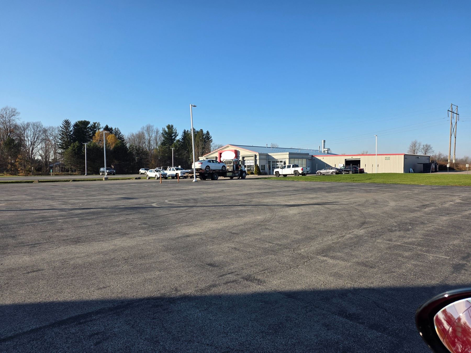 5967 Robinson Rd. - 80-vehicle paved & lighted parking lot with 1,000+/- SF of office/showroom space