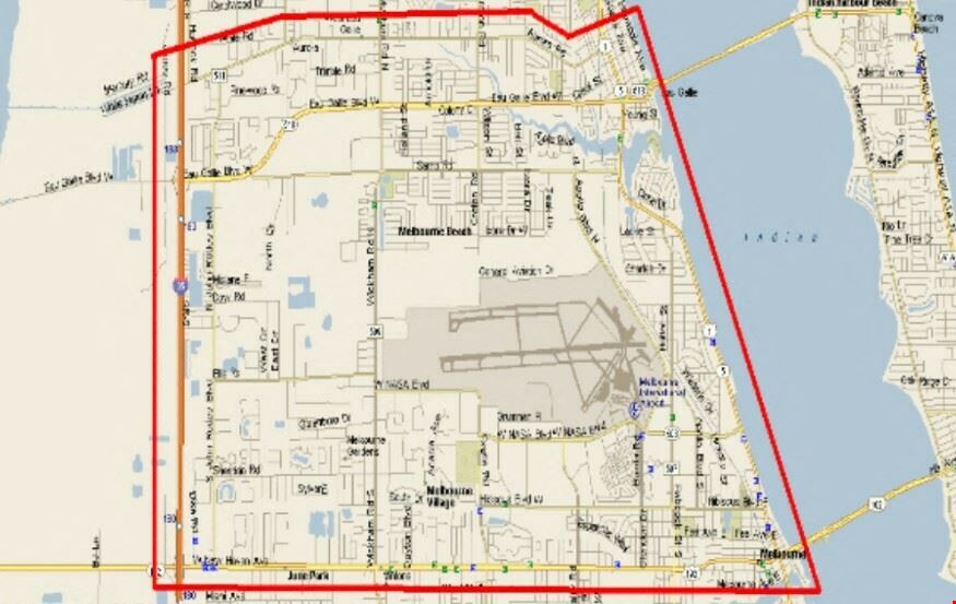 THE 2.08 ACRES OF MULTI-FAMILY LAND IMPROVED WITH SINGLE-FAMILY HOMES
