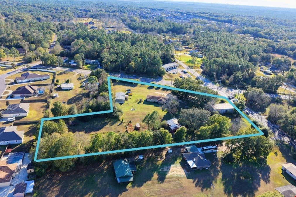 7998 Mobile Hwy | Signalized Hard Corner For Sale