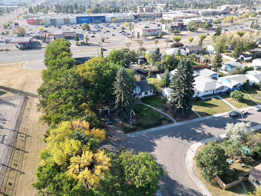 5207, 5209, 5211 - 101A Ave
