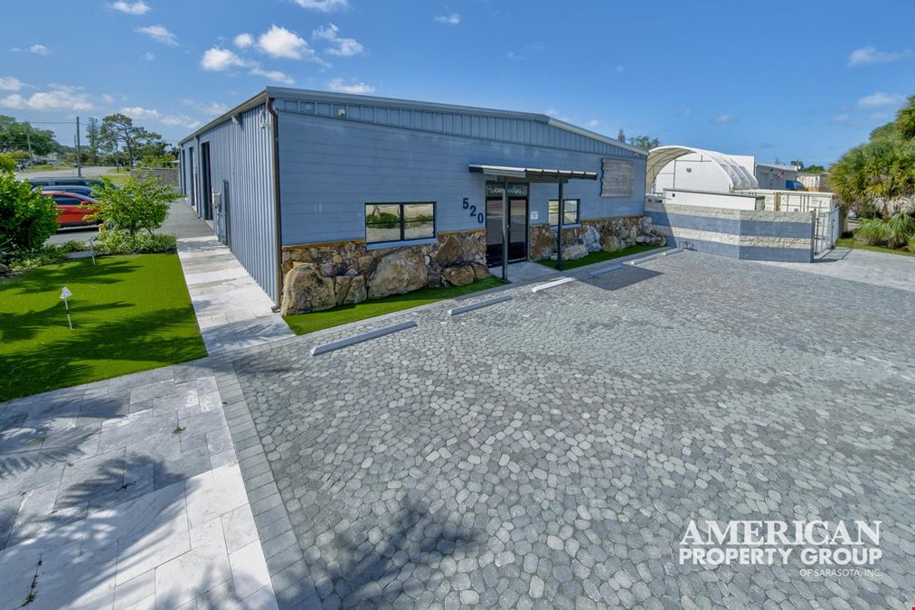 Corner Lot Industrial Property with Showroom, Office, and Yard