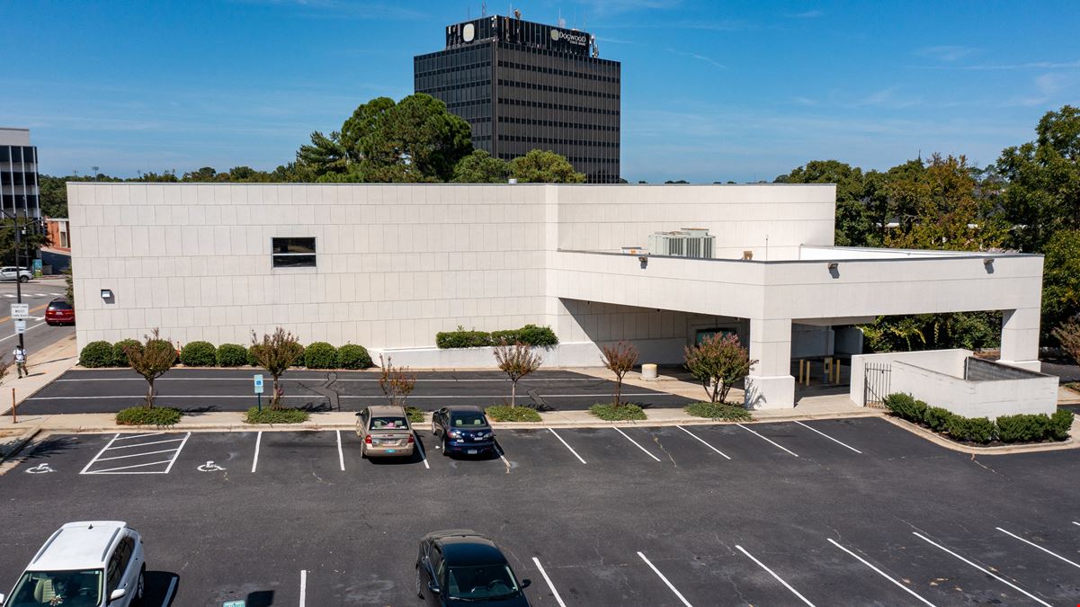 Office Building with Surface Parking Lot in Downtown