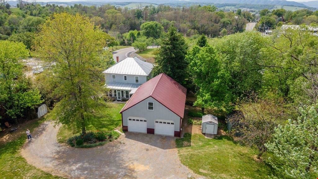 UPDATED RESIDENCE & 30X40 SHOP | ZONED BUSINESS ON 1.3 ACRES