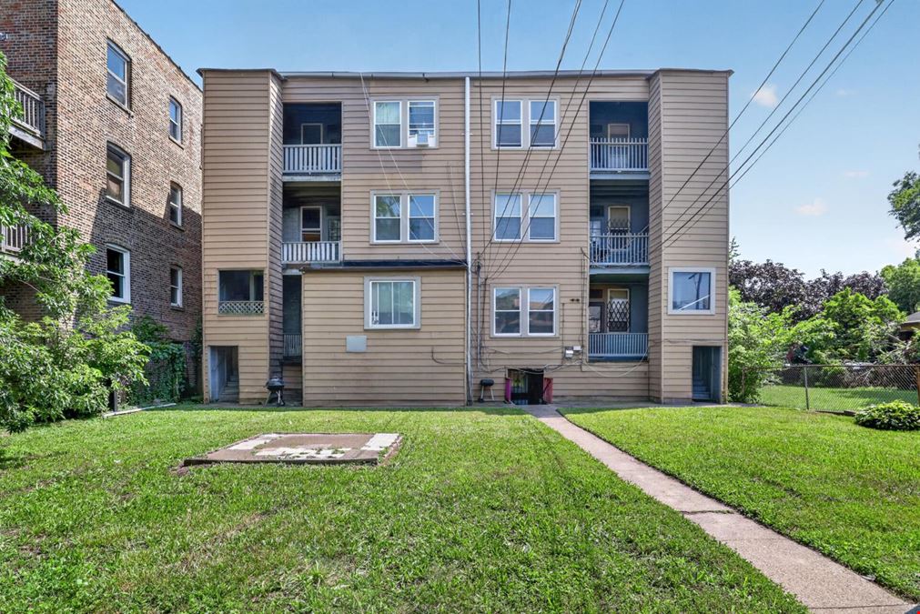 1528 E 74TH PL | 6 Unit Multifamily