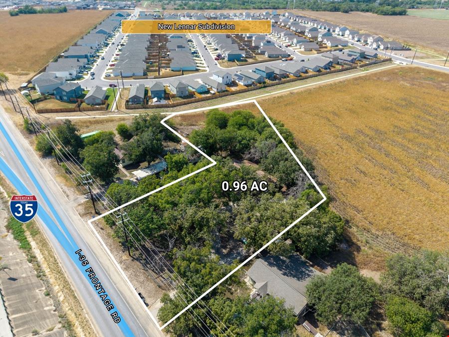 0.96 AC on I-35 South Frontage, Zoned C-3R / I-1, 1,960 SF Building