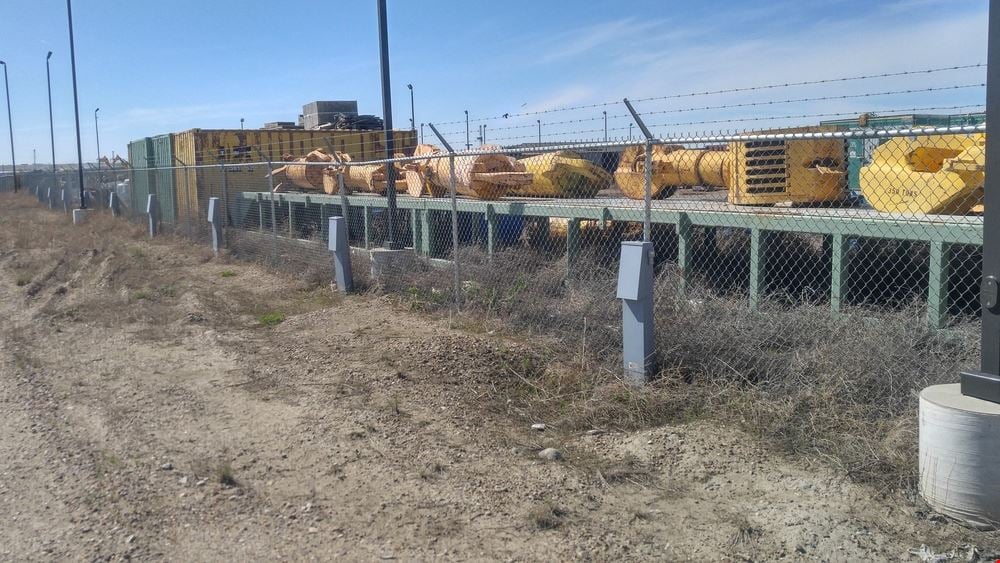 ±14,000 SF Industrial Shop | ±6.63 Fenced Yard | Williston ND