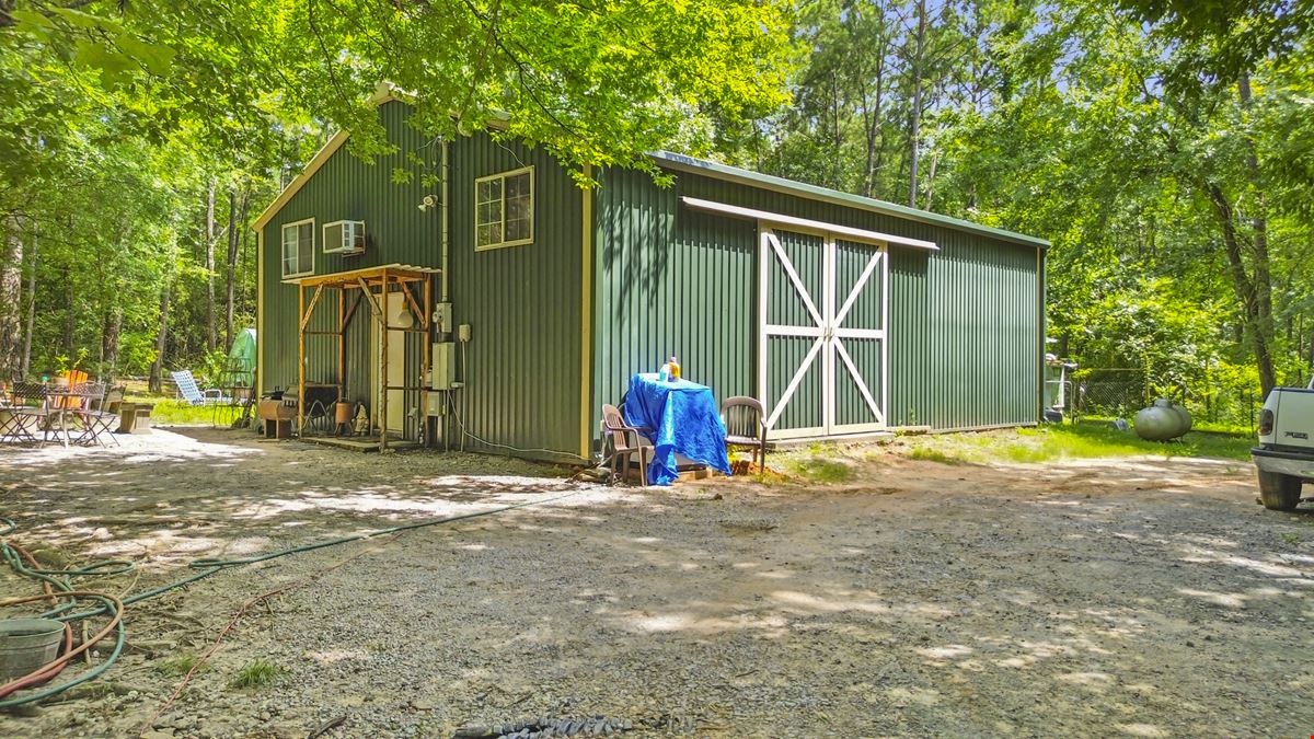 Prime Interstate-Frontage Commercial Tract – ±8.8 Acres with 3 Income Producing Building